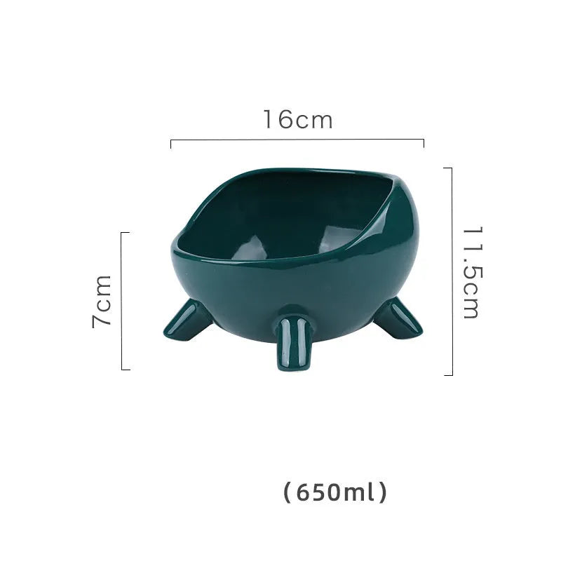 Green ceramic pet food bowl with four legs and a wide, rounded opening.