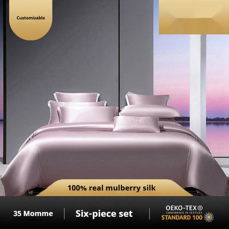 Solid colour silk four-piece quilt cover set shown in a light luxury bedroom setting.