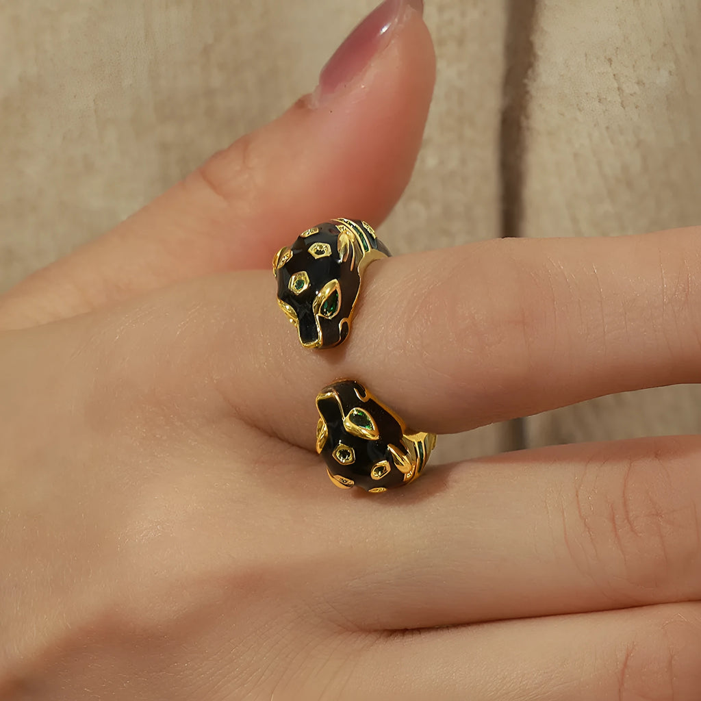 Women's black cheetah print copper ring with geometric open design in size 7