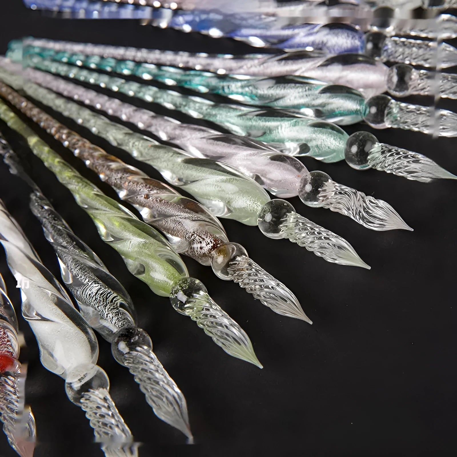 Transparent glass crystal pen with coloured ink visible inside, abstract modelling design