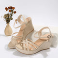 Women's wedge sandals with fish mouth toe design in black or beige cloth upper
