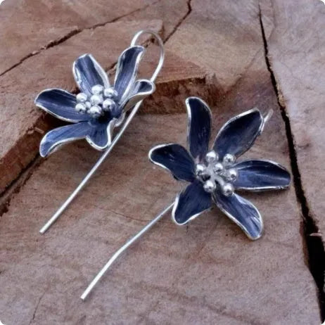 Purple flower-shaped alloy earrings with retro design and electroplated finish