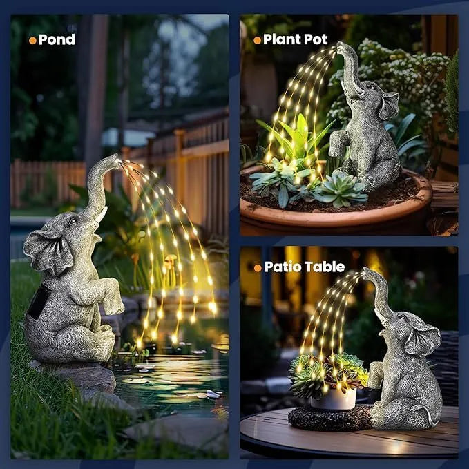 Resin elephant garden statue with integrated LED light strip for outdoor decoration.