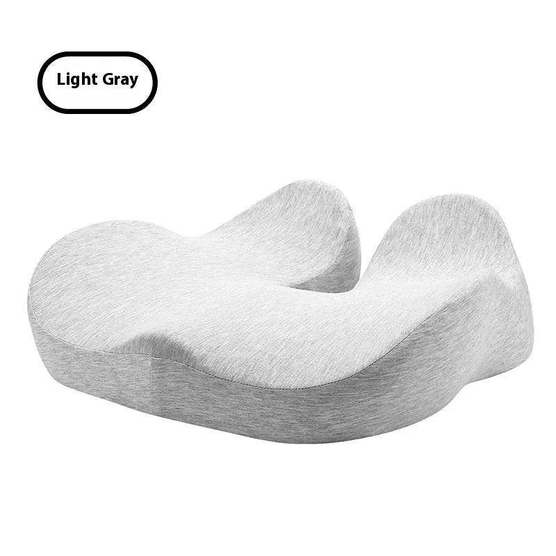 Grey memory foam office chair cushion on a desk chair