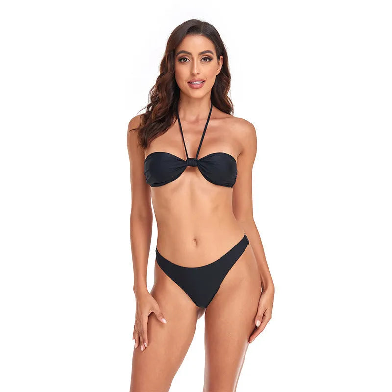 Black women's lace-up tube top bikini set with separate briefs in polyester swimwear fabric.