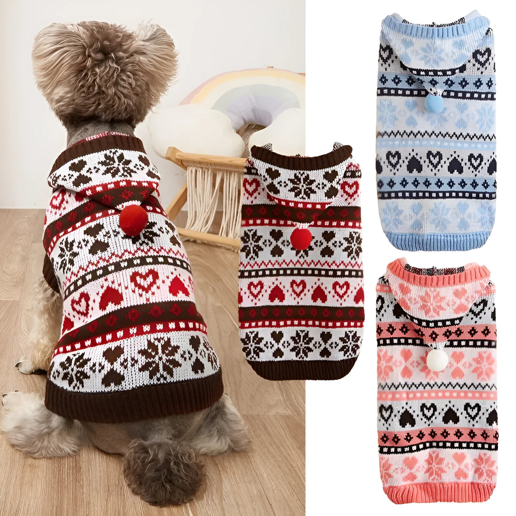 Pink striped camouflage knitted dog sweater with snowflake and heart pattern on a small white dog.