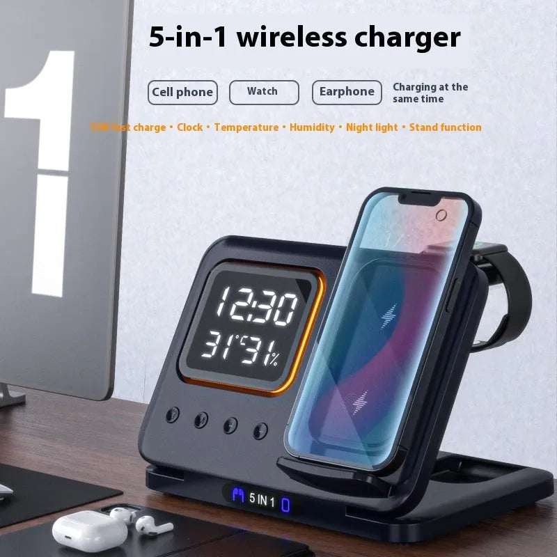 Black foldable wireless charging station displaying time and temperature, charging a phone and smartwatch.