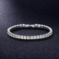 Electroplated real platinum square diamond bracelet with geometric design and gang drill elements in zircon