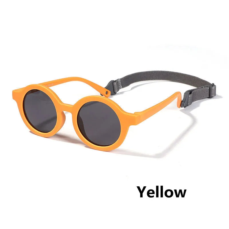 Soft silicone round-frame sunglasses for babies and toddlers aged 0-3 years with polarised UV400 lenses.