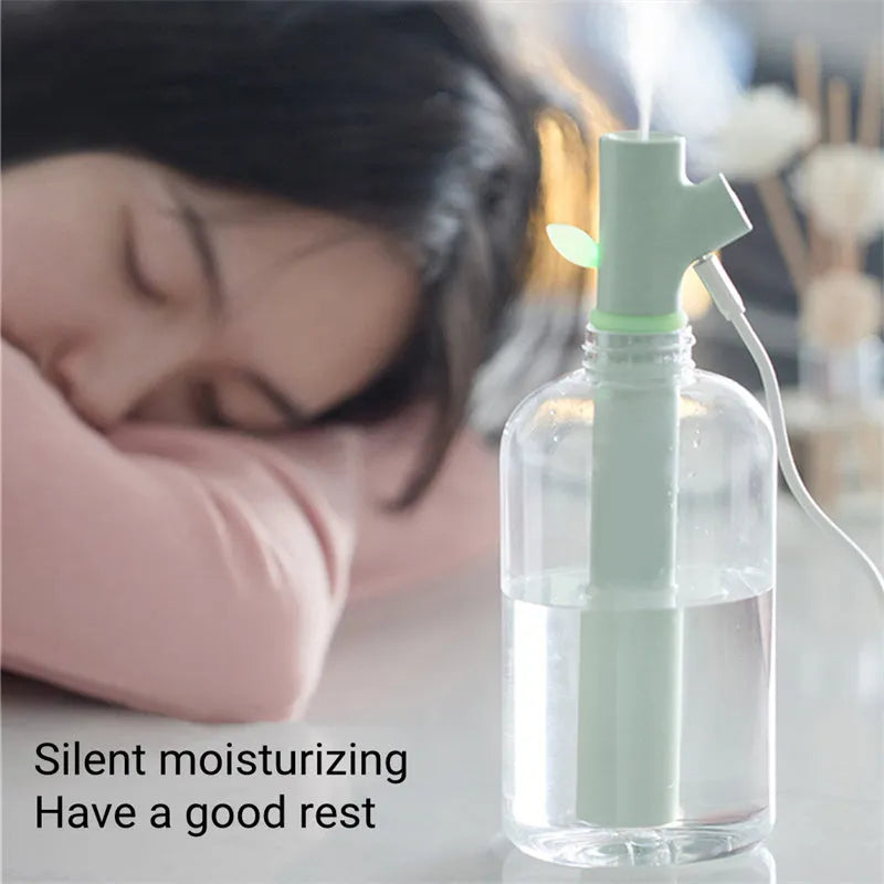 Transparent portable USB humidifier with ultrasonic mist production on desk