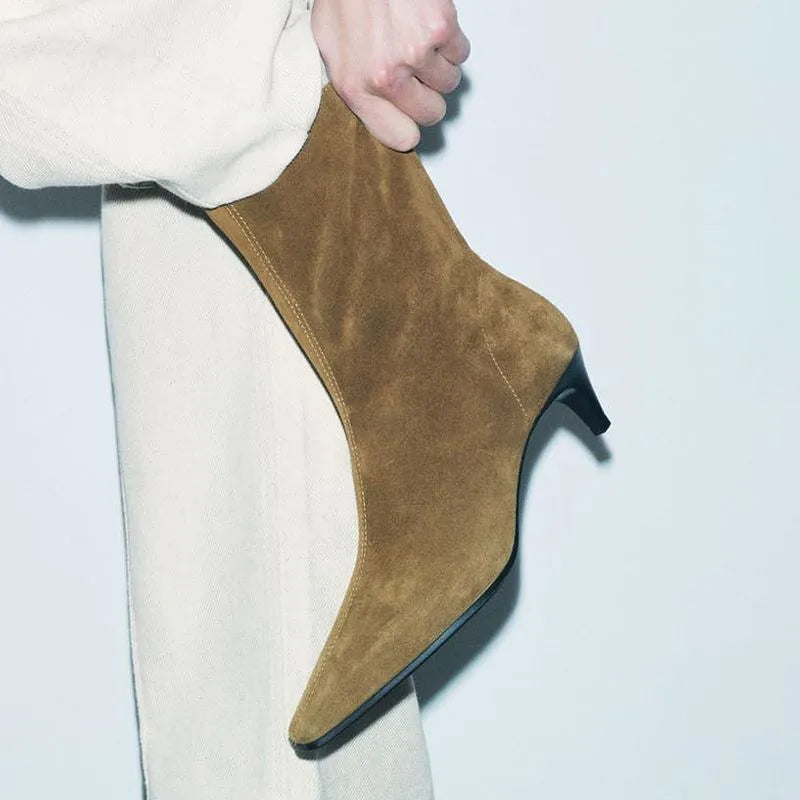 Women's brown square toe ankle booties with a side zipper and stiletto mid heel