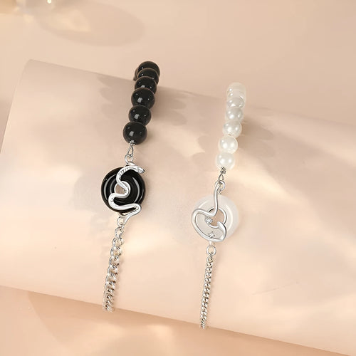 925 sterling silver couple bracelet with snake charm, obsidian pearl, and safe buckle in new Chinese style.