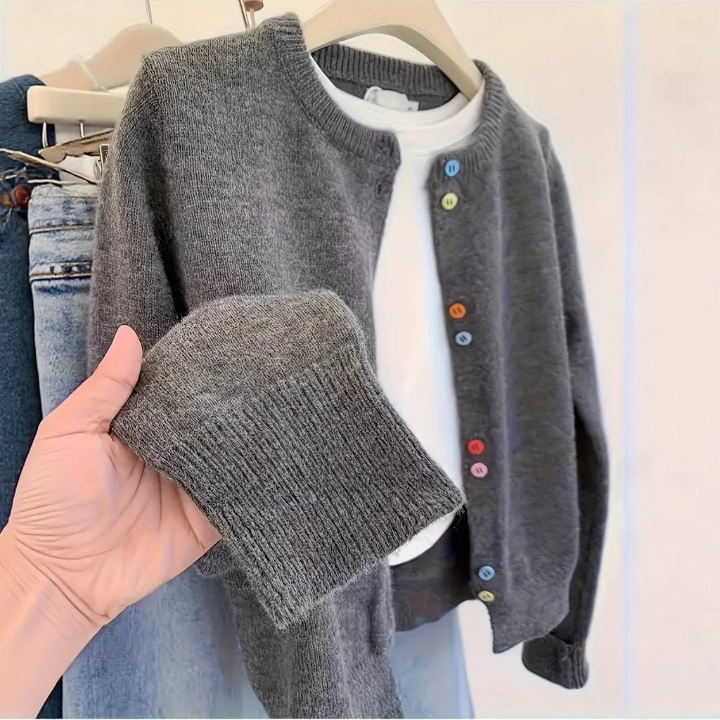 Dark grey women's cardigan sweater with button front and long sleeves.