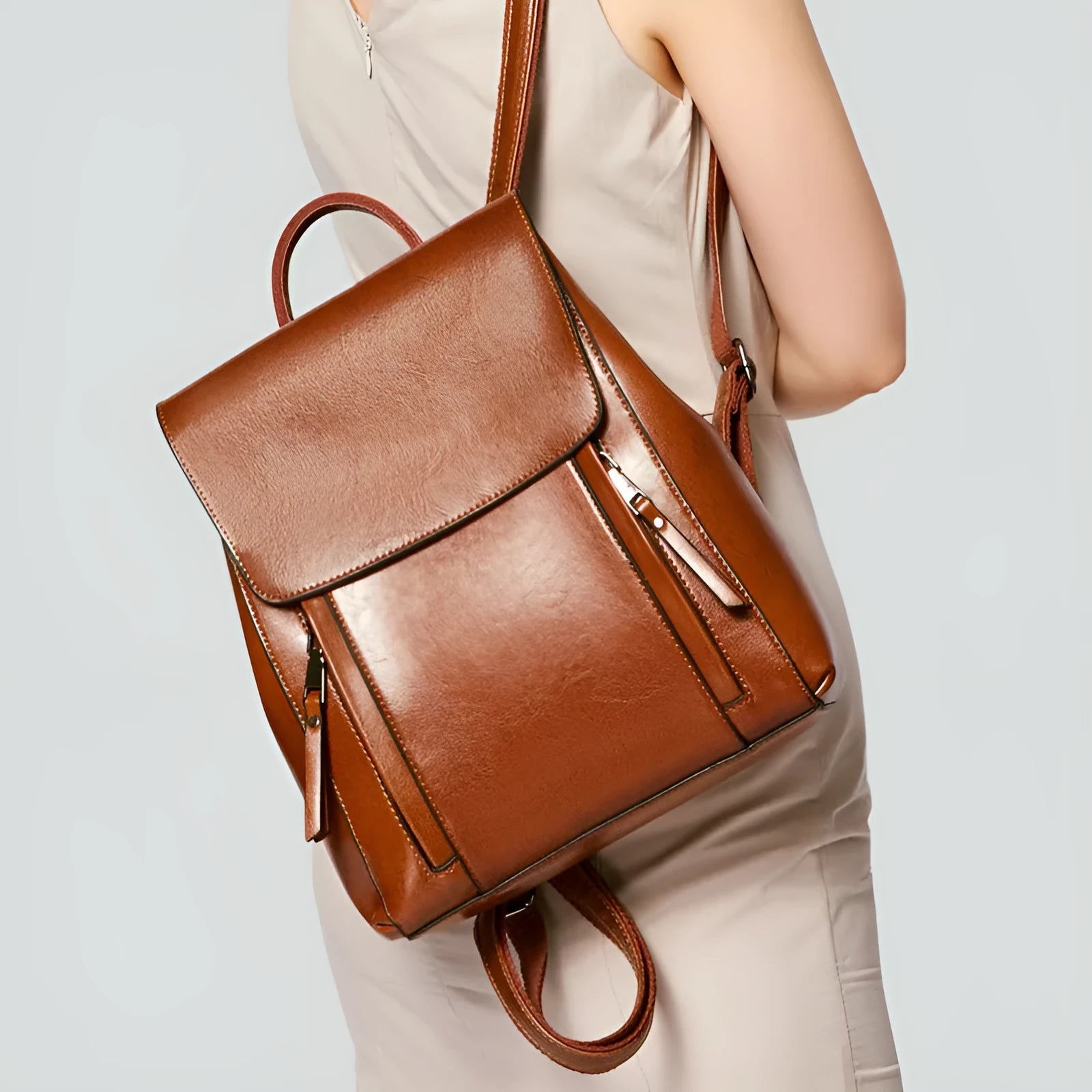 Genuine leather women's backpack in oil wax cowhide with multiple internal compartments
