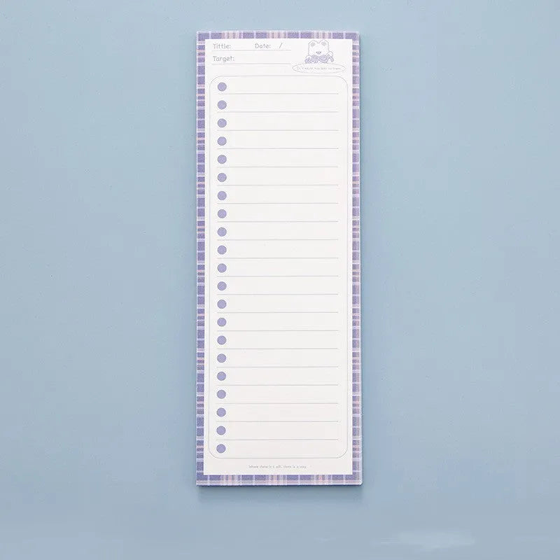 Cartoon character sticky note pad in a plastic storage box showing colourful striped and bear designs