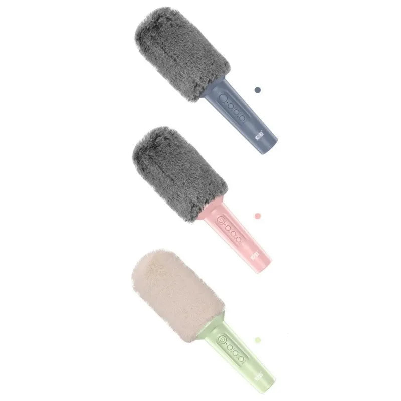 Wireless Bluetooth karaoke microphone in pink, blue, and green colour options showing integrated audio design.