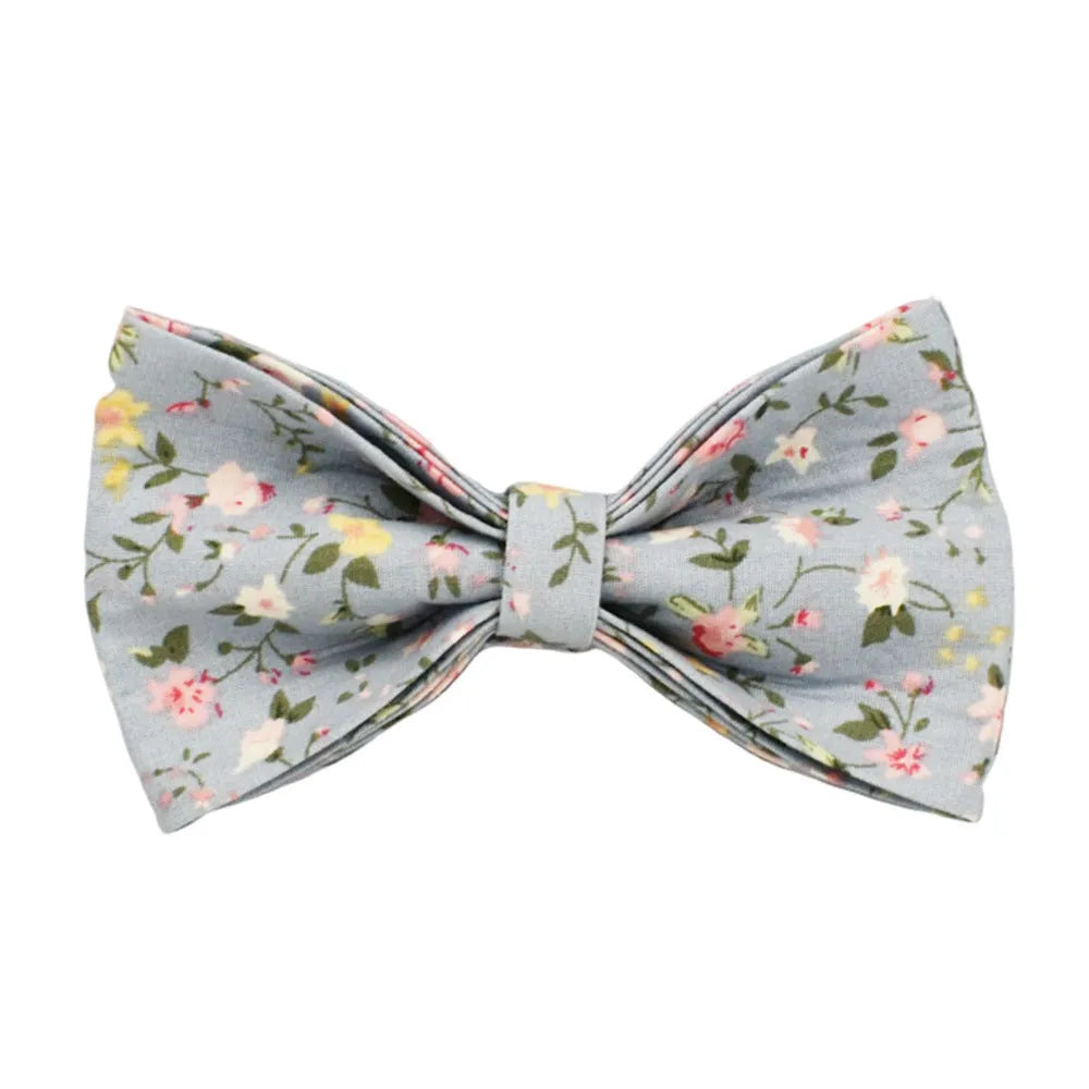 Blue floral patterned cloth dog collar with matching leash, vest, bow, and poop bag set for pet gifts