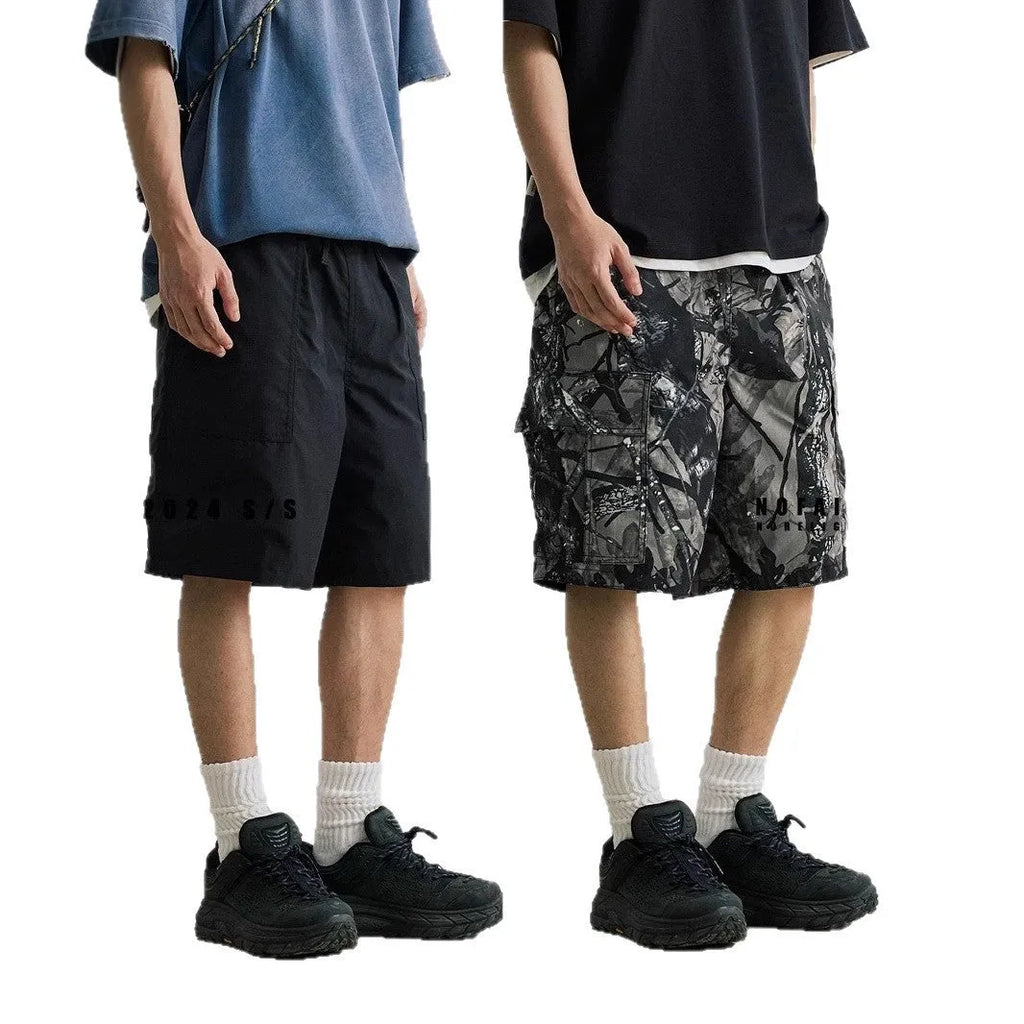 Loose casual straight-leg denim shorts in black colour with mid-waist design and zip fly placket