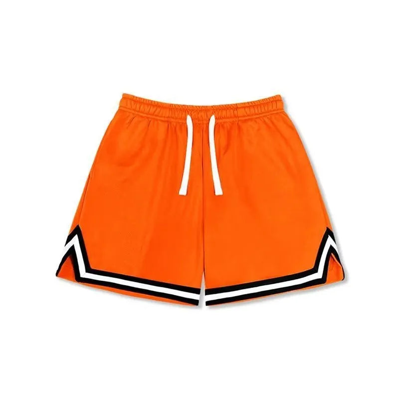 Man wearing loose grey sports shorts made from polyester fabric, showcasing the fit and style.