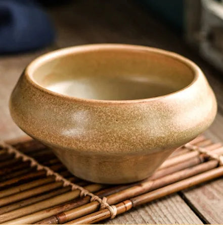 Tall porcelain Japanese soup bowl with stone conch shape and underglaze retro pattern.
