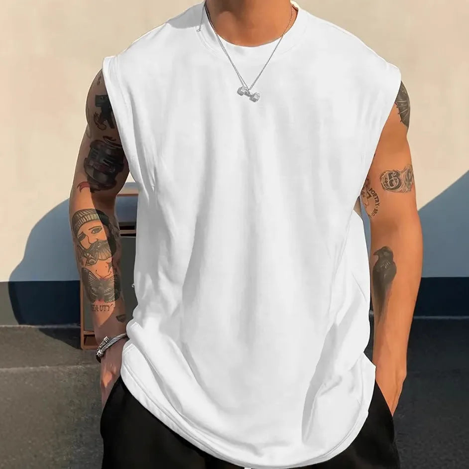 Men's loose fit cotton sleeveless tank top in solid colours showing front view