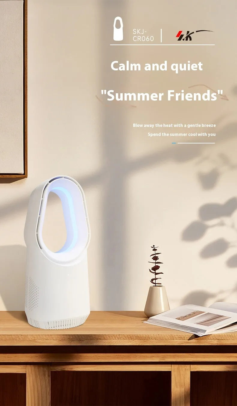 White bladeless tower fan with remote control on floor next to desk