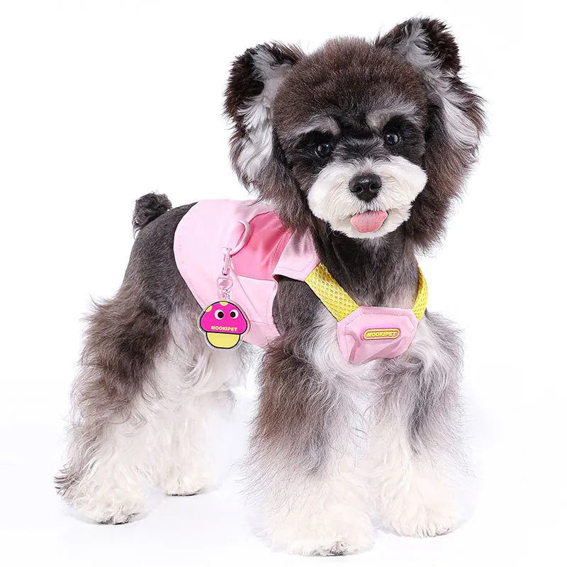 Pink polyester dog vest for small breeds on mannequin showing vest closure