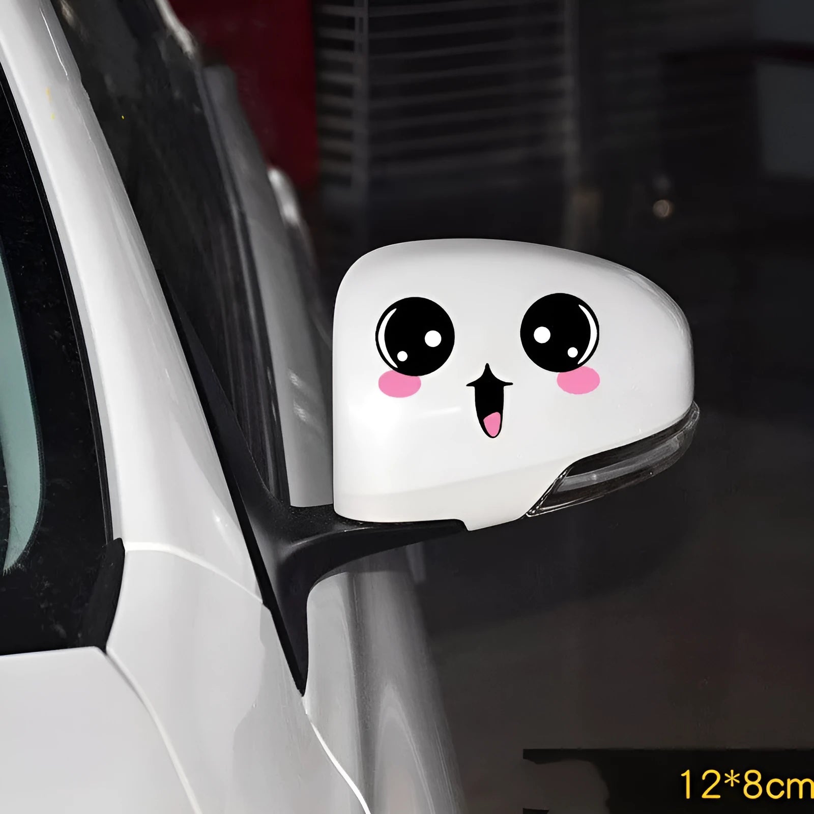 A pair of reflective cartoon car eye stickers on a vehicle body.