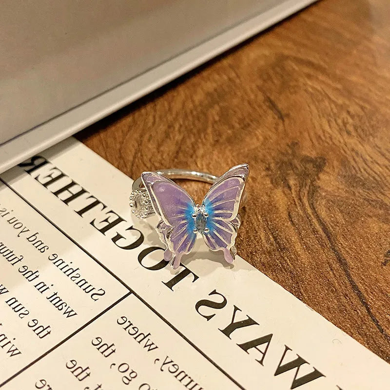 Butterfly women's copper ring with adjustable split ring design showing oil-drip colour treatment