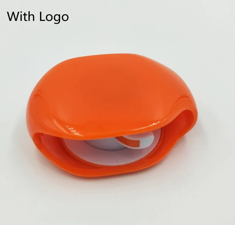 Automatic earphone cable winder retractor in PC ABS plastic, showing compact size and multiple colour options.