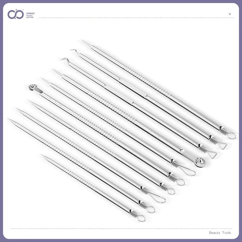 Four silver metal acne needles with ultra-fine pointed tips for skincare treatment.