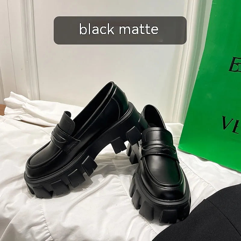 British style wide fit loafers in patent leather with a rubber sole