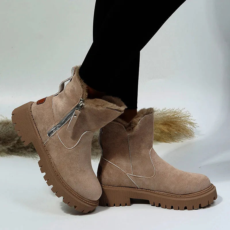 Women's black thick plush snow boots with side zipper, faux suede upper, and non-slip rubber sole.