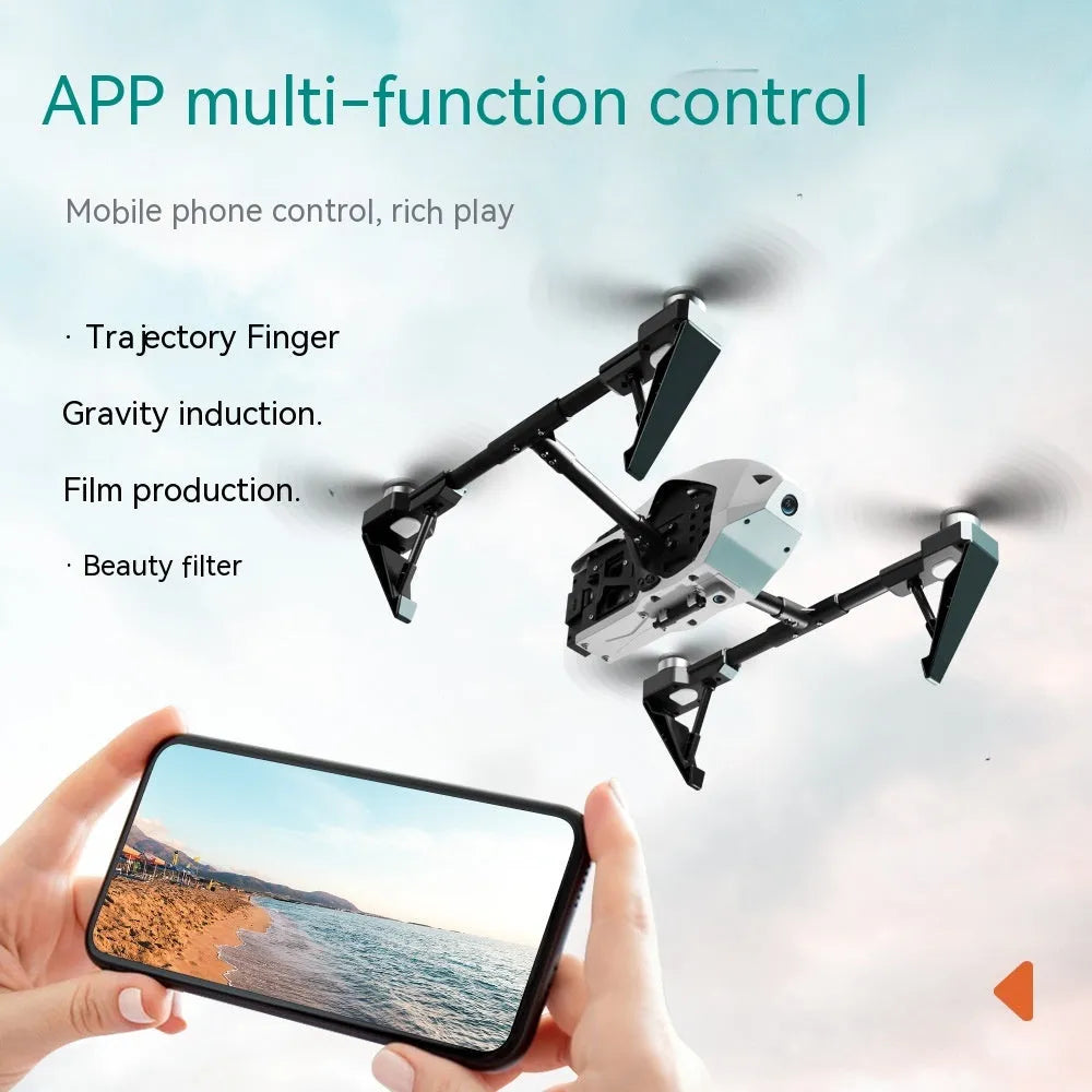 KS66 white alloy UAV drone with remote control and accessories on grass