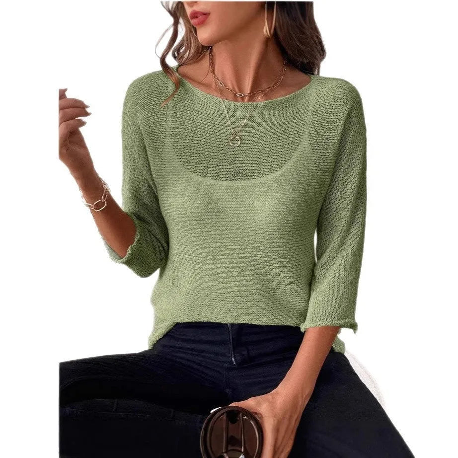 Thin knitted off-shoulder top for women with 3/4 sleeves and a see-through 3D pattern in multiple colour options.