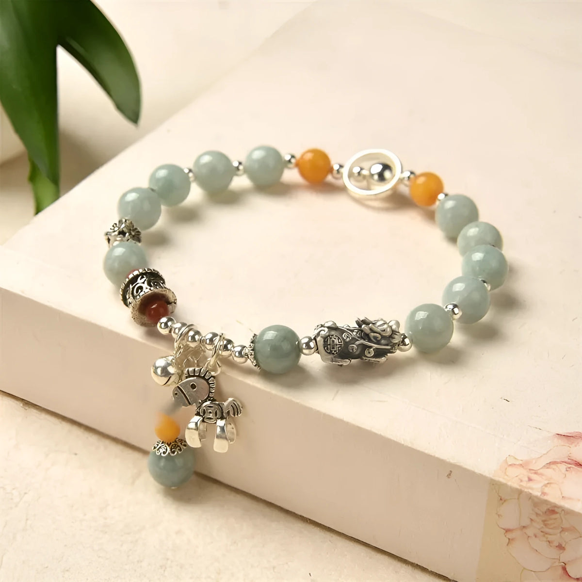 Natural jade vintage bracelet with 8-9mm beads and alloy metal accents on wrist