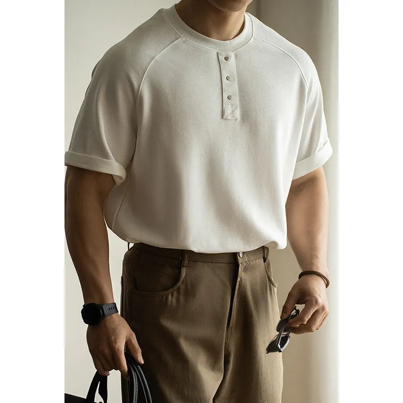 Casual loose top with raglan sleeves in terry texture fabric, shown in neutral colours