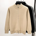 Men's black high collar zip-up knitted cardigan on a hanger, loose fit.