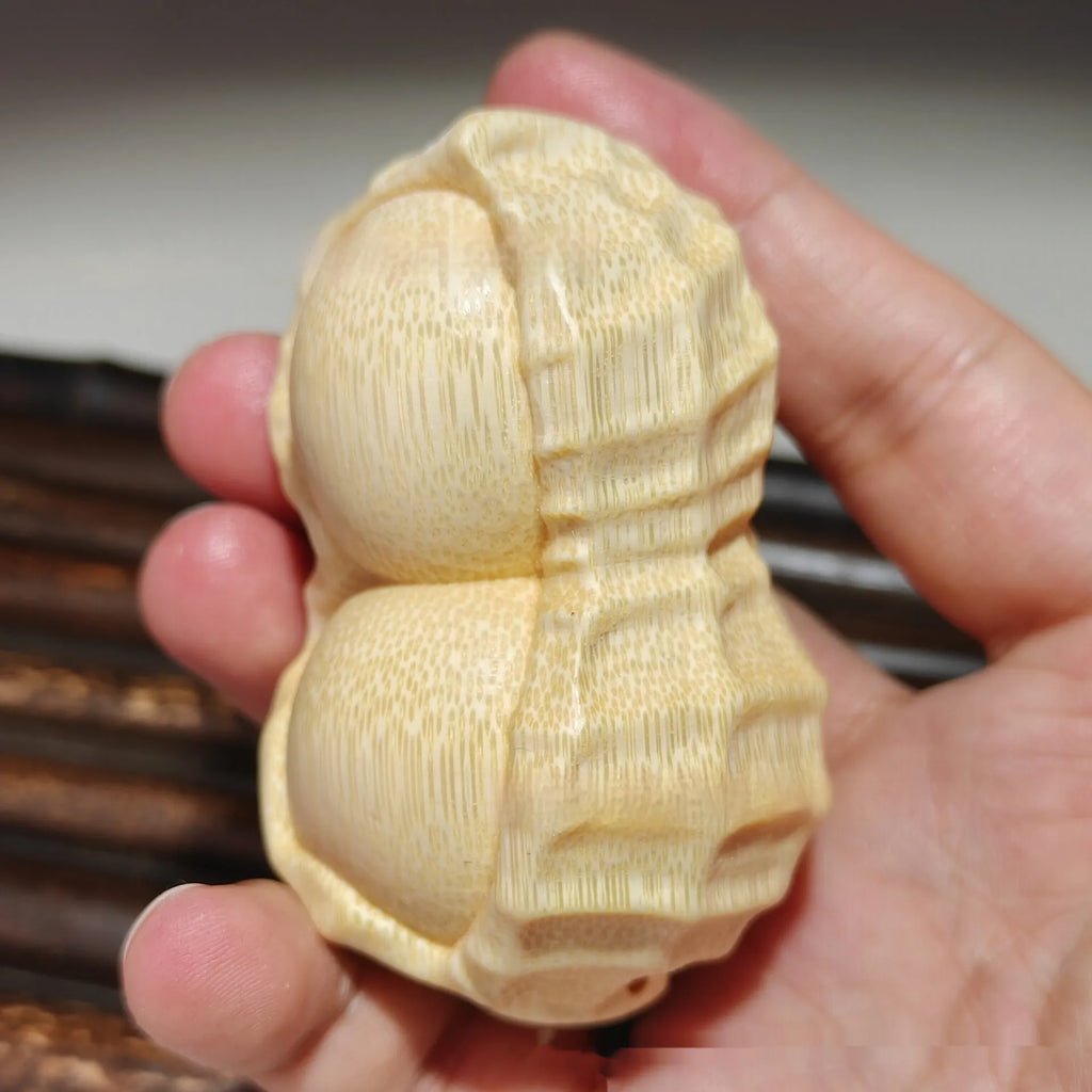 Solid bamboo carving peanut ornament with modern simplicity style and 'May Good Things Happen' message
