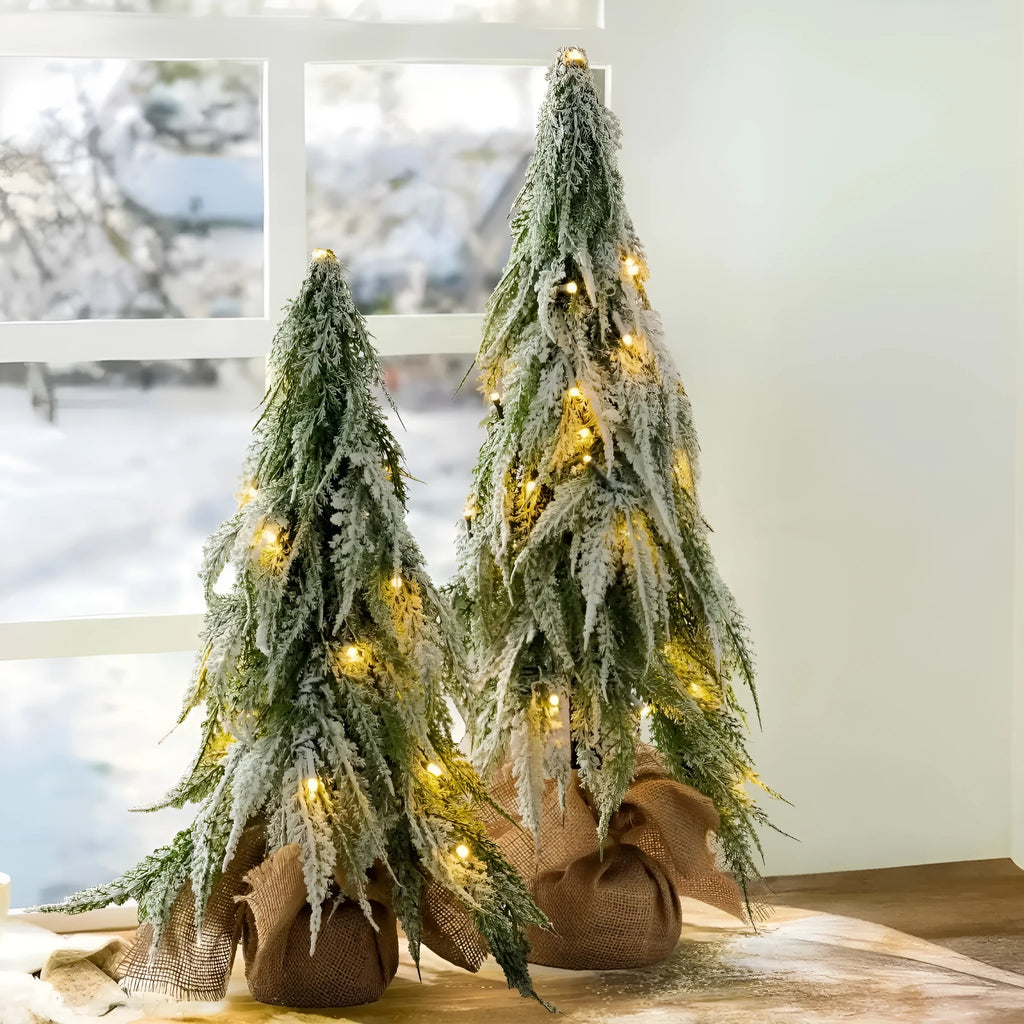 24 inch artificial Christmas tree sprayer with lights on desktop