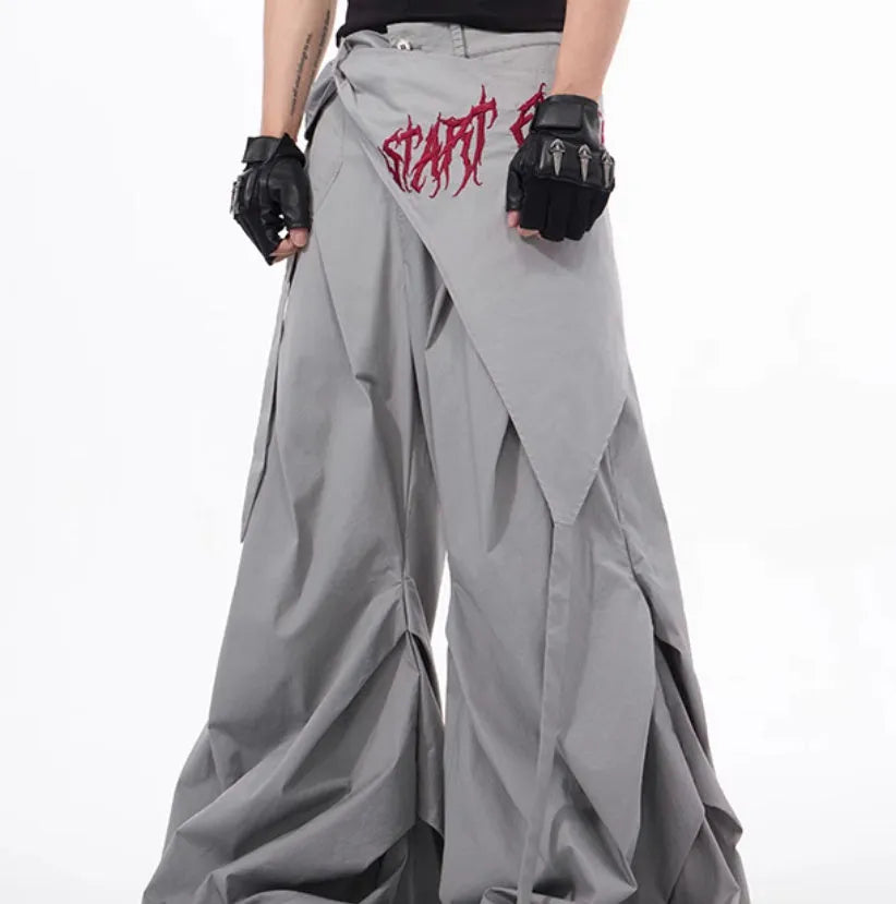 Boy modelling black wide-leg Korean-style casual trousers.