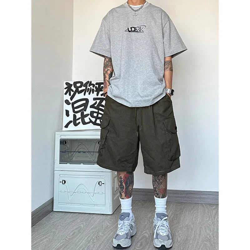 Men's black polyester straight-leg sports shorts with micro-elastic fabric on mannequin
