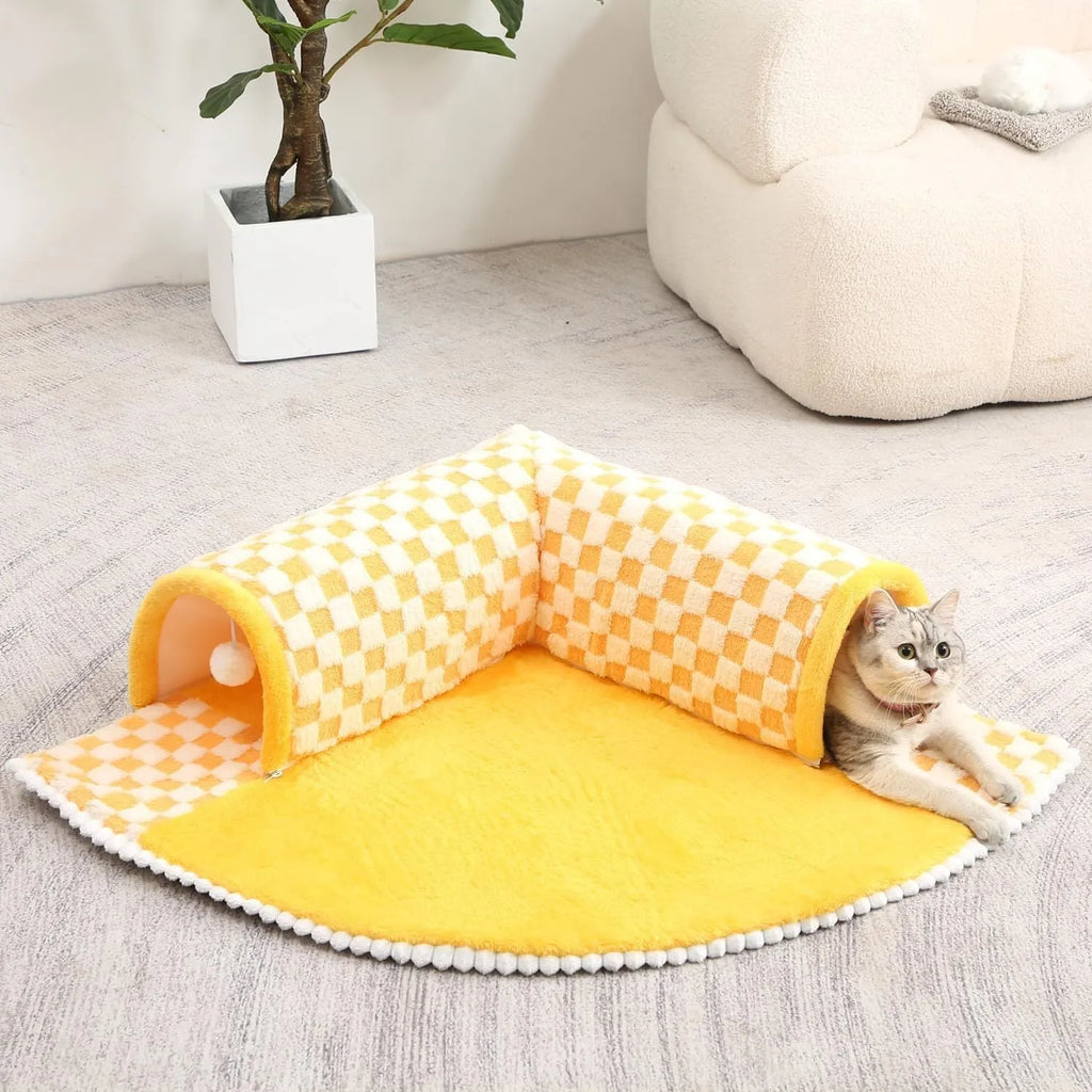 Fan-shaped plaid pet bed with integrated tunnel for dogs and cats in coffee colour, showing soft plush fabric.