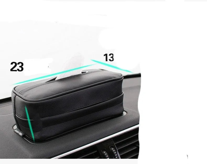 Black PU leather hanging storage box for car console organisation, shown with paper bag filler.