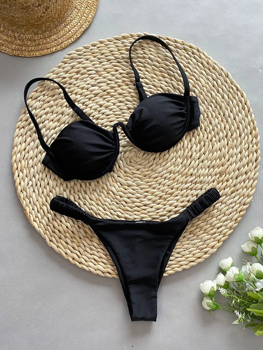 Women's black underwire bikini swimsuit with split briefs showing European American fit and high elasticity fabric