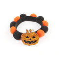Halloween pet collar with fur ball decoration in six design variations for dogs and cats