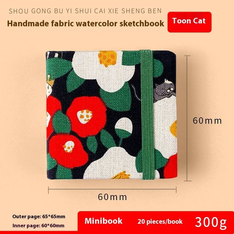 Feiluniao handmade fabric watercolour sketchbook with decorative cover, shown at 185mm length.
