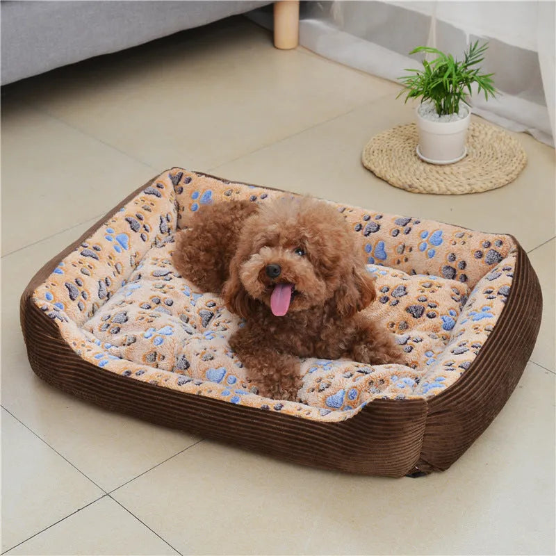 Beige plush dog bed with raised sides shown on a wooden floor.