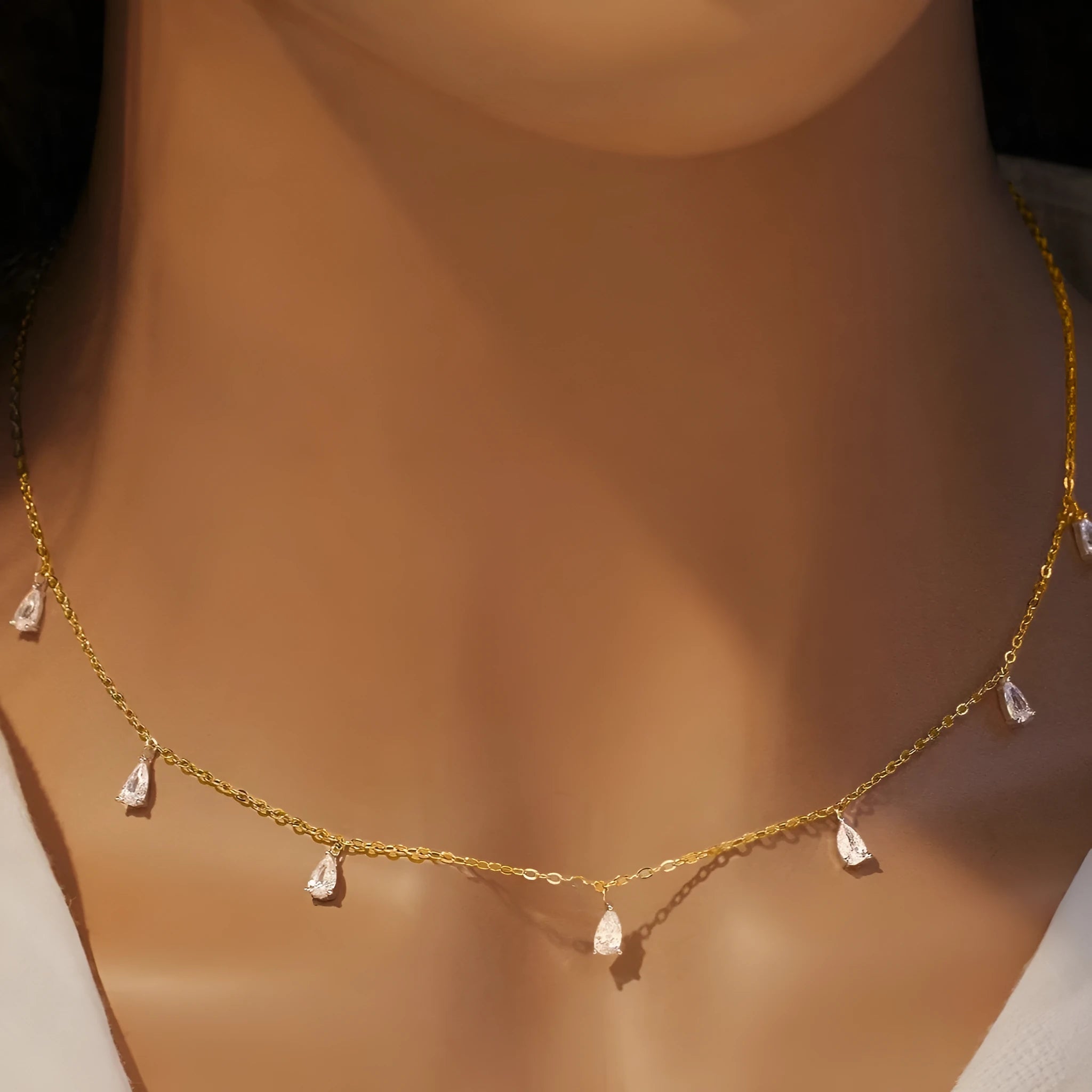 Women's 925 silver drop-shaped artificial zircon necklace on an adjustable O-chain, shown in silver finish.