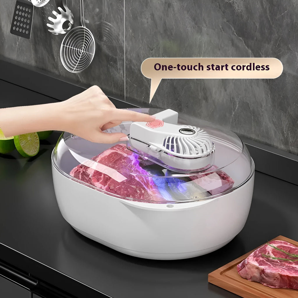 A modern aluminium household defrosting plate with a USB cable on a kitchen worktop.
